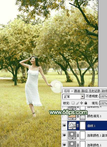 ‘Photoshop将树景人物图片打造灿烂的黄绿色‘