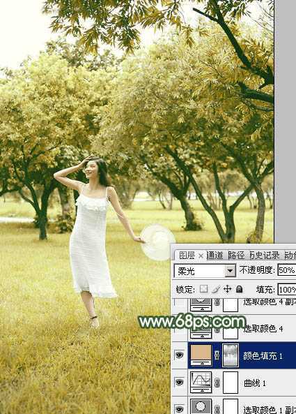 ‘Photoshop将树景人物图片打造灿烂的黄绿色‘