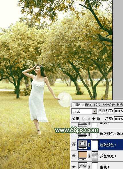 ‘Photoshop将树景人物图片打造灿烂的黄绿色‘