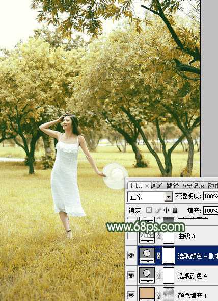 ‘Photoshop将树景人物图片打造灿烂的黄绿色‘