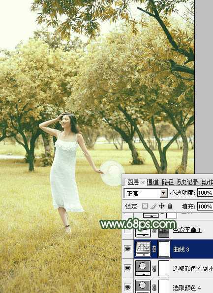 ‘Photoshop将树景人物图片打造灿烂的黄绿色‘