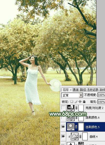 ‘Photoshop将树景人物图片打造灿烂的黄绿色‘