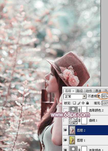 ‘Photoshop为绿树中的美女加上唯美的青红色‘