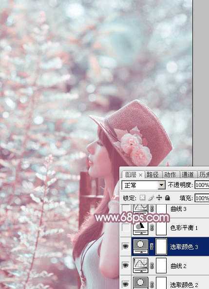 ‘Photoshop为绿树中的美女加上唯美的青红色‘