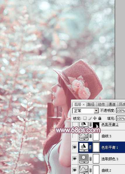 ‘Photoshop为绿树中的美女加上唯美的青红色‘