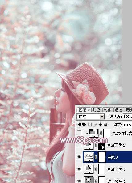 ‘Photoshop为绿树中的美女加上唯美的青红色‘