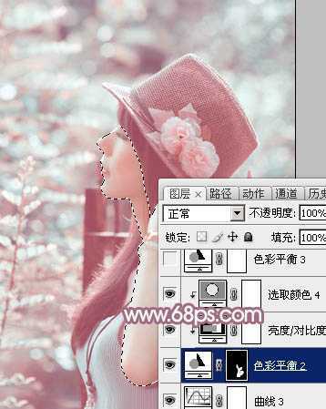 ‘Photoshop为绿树中的美女加上唯美的青红色‘