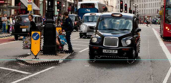 ‘Photoshop将街道图片调出雨水湿润的路面‘