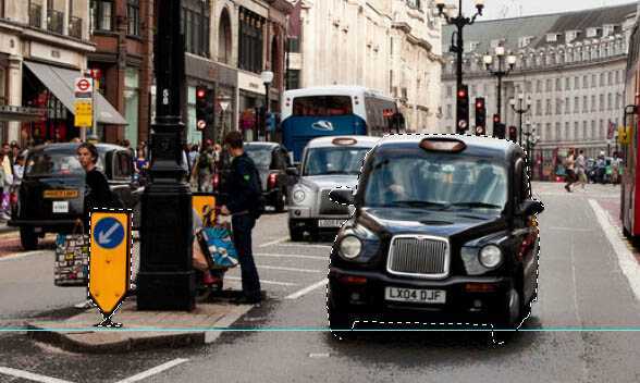 ‘Photoshop将街道图片调出雨水湿润的路面‘