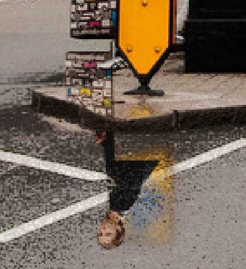 ‘Photoshop将街道图片调出雨水湿润的路面‘