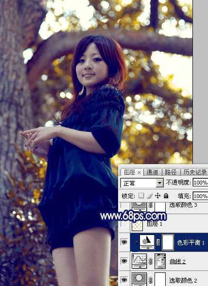 ‘Photoshop将大树边的人物调制出斑斓的霞光暖色‘