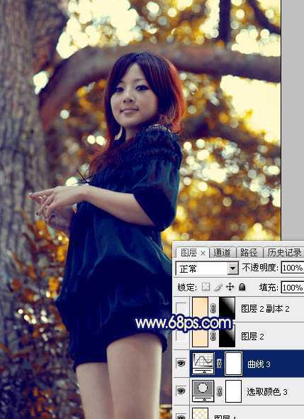 ‘Photoshop将大树边的人物调制出斑斓的霞光暖色‘