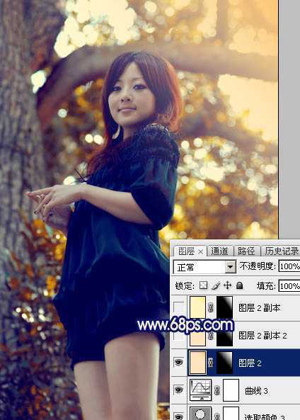 ‘Photoshop将大树边的人物调制出斑斓的霞光暖色‘