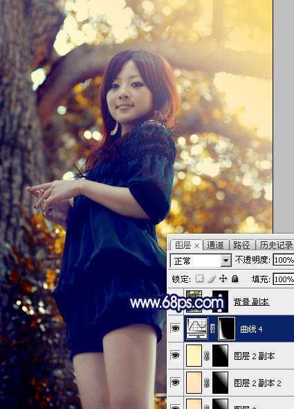 ‘Photoshop将大树边的人物调制出斑斓的霞光暖色‘