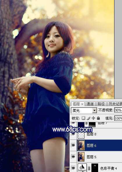 ‘Photoshop将大树边的人物调制出斑斓的霞光暖色‘
