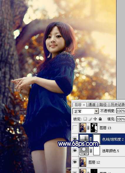 ‘Photoshop将大树边的人物调制出斑斓的霞光暖色‘
