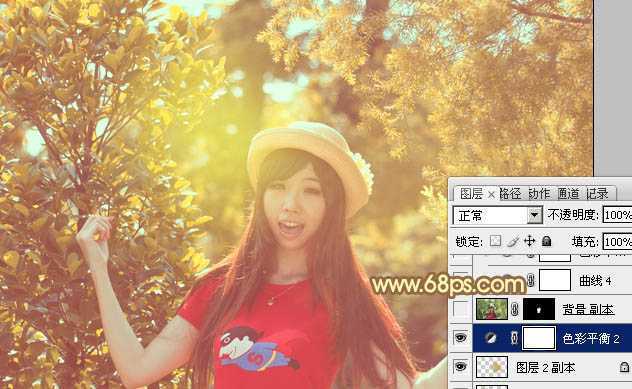 ‘Photoshop将树林人物图片加上唯美柔和的红褐色‘