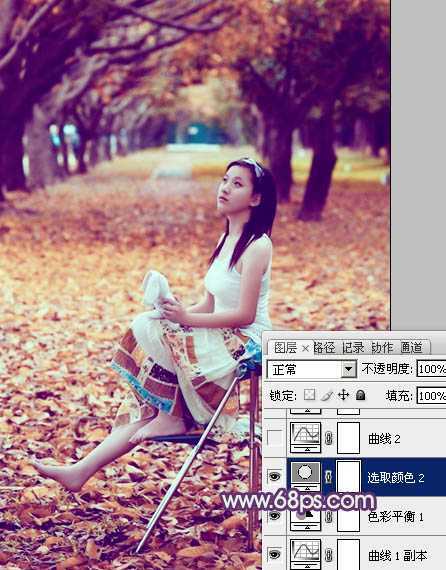 ‘Photoshop将树林写真人物图片打造出漂亮的橙紫色‘