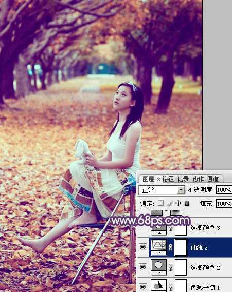 ‘Photoshop将树林写真人物图片打造出漂亮的橙紫色‘