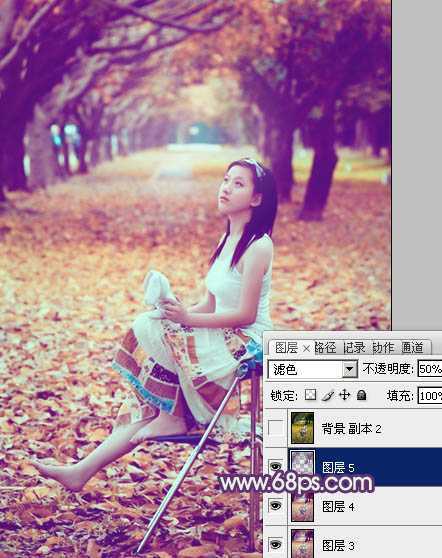 ‘Photoshop将树林写真人物图片打造出漂亮的橙紫色‘