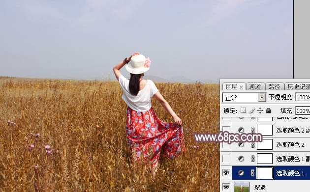 ‘Photoshop为荒草中的人物调出逆光暗调青红色‘