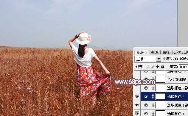 ‘Photoshop为荒草中的人物调出逆光暗调青红色‘