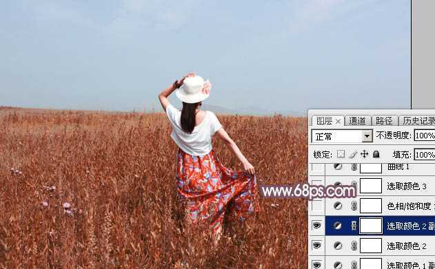 ‘Photoshop为荒草中的人物调出逆光暗调青红色‘