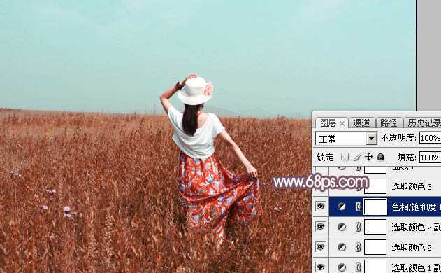 ‘Photoshop为荒草中的人物调出逆光暗调青红色‘