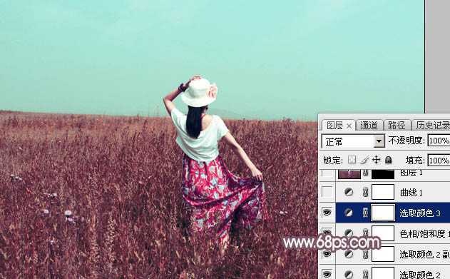 ‘Photoshop为荒草中的人物调出逆光暗调青红色‘