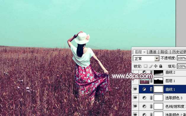 ‘Photoshop为荒草中的人物调出逆光暗调青红色‘