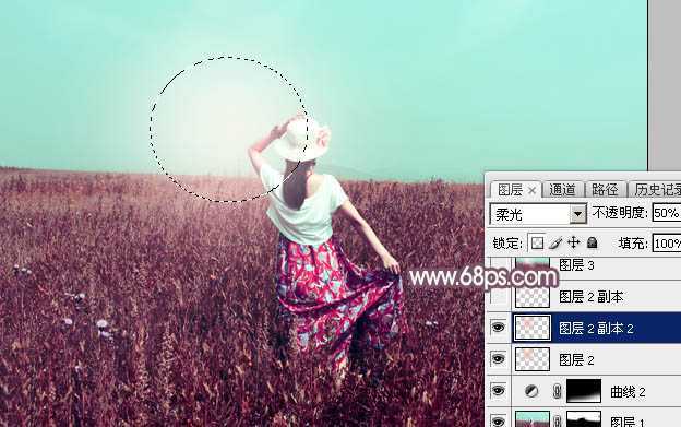 ‘Photoshop为荒草中的人物调出逆光暗调青红色‘