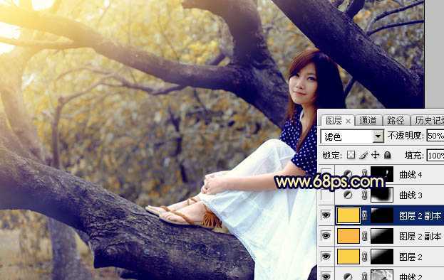 ‘Photoshop调出秋季黄褐色树干上的美女图片‘