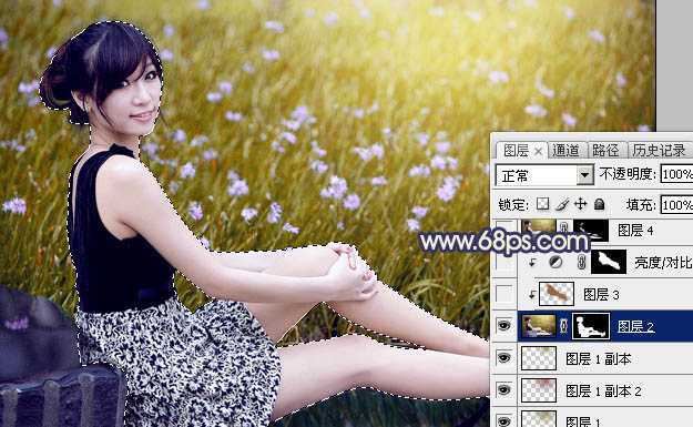 ‘Photoshop为草地美女图片打造甜美的暗褐色‘