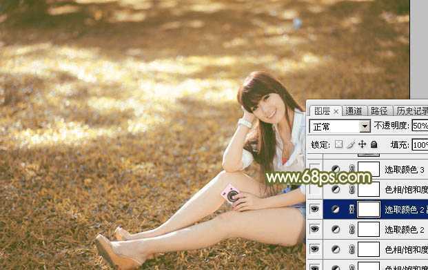‘Photoshop为草地上的美女加上甜美的深秋黄褐色‘