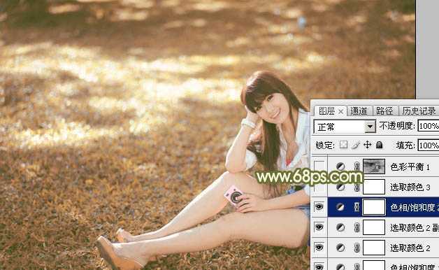 ‘Photoshop为草地上的美女加上甜美的深秋黄褐色‘