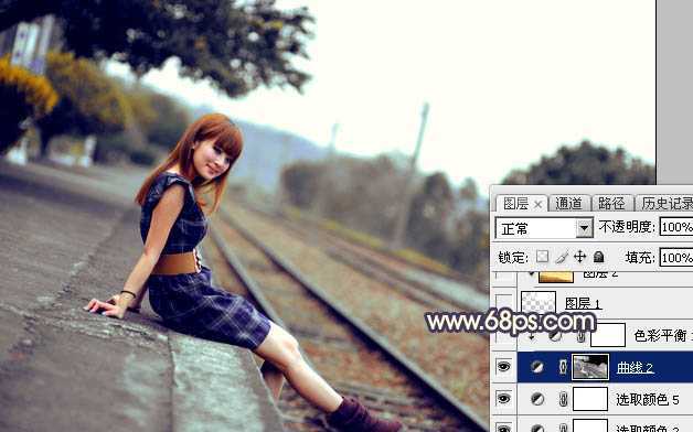 ‘Photoshop调出唯美的霞光色铁轨美女‘