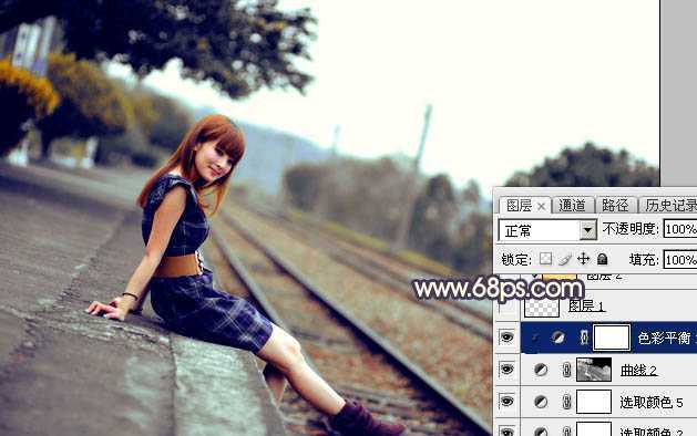 ‘Photoshop调出唯美的霞光色铁轨美女‘