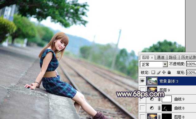 ‘Photoshop调出唯美的霞光色铁轨美女‘