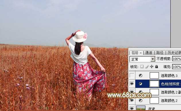 ‘Photoshop给田野中的美女调制出流行的秋季青红色‘