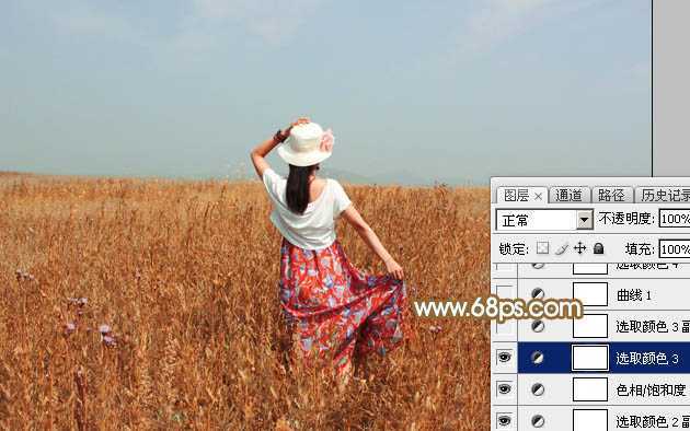 ‘Photoshop给田野中的美女调制出流行的秋季青红色‘