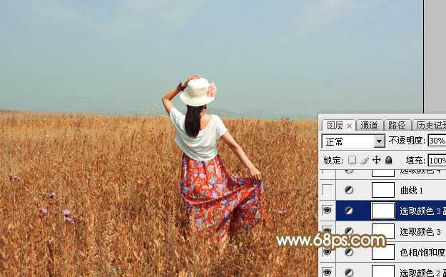 ‘Photoshop给田野中的美女调制出流行的秋季青红色‘