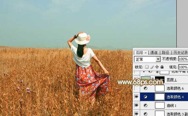 ‘Photoshop给田野中的美女调制出流行的秋季青红色‘
