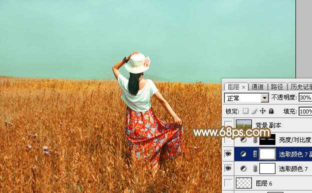 ‘Photoshop给田野中的美女调制出流行的秋季青红色‘