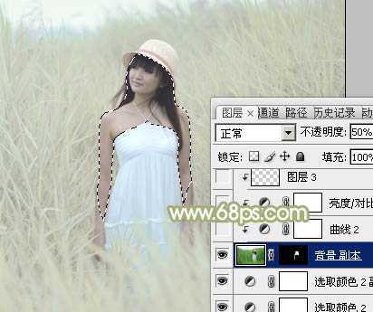 ‘Photoshop将芦苇美女图片打造非常淡雅的冷色调‘