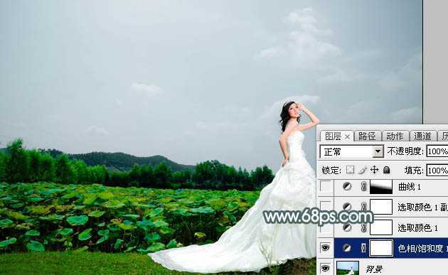 ‘Photoshop为荷塘边的美女加上古典青色调‘