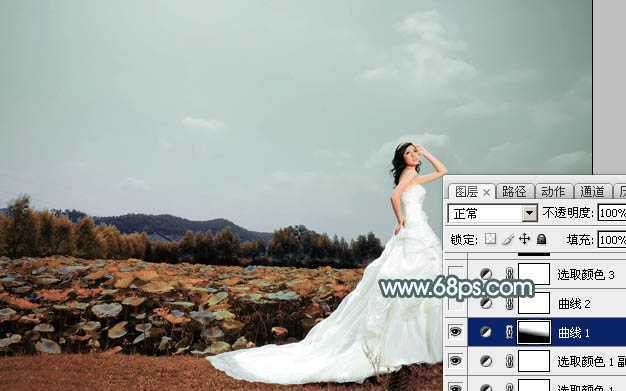 ‘Photoshop为荷塘边的美女加上古典青色调‘