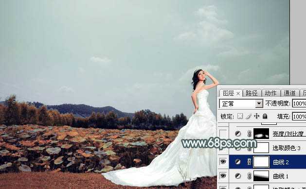 ‘Photoshop为荷塘边的美女加上古典青色调‘
