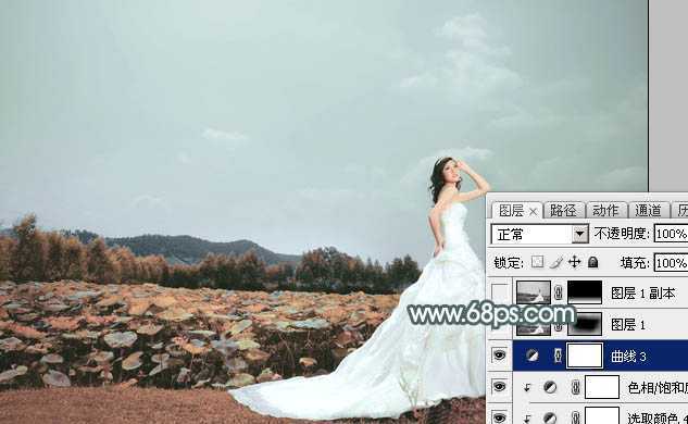 ‘Photoshop为荷塘边的美女加上古典青色调‘