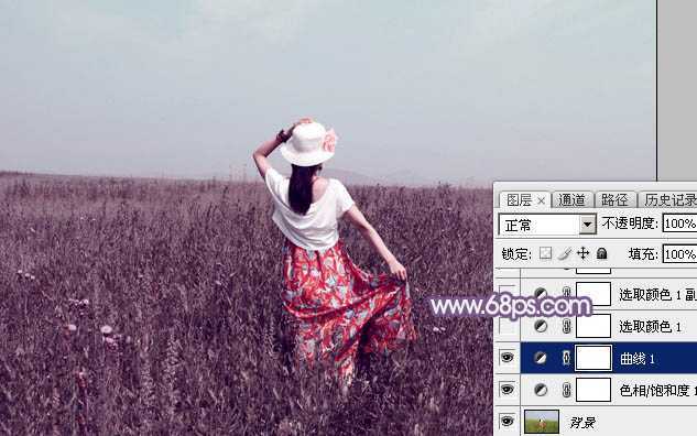 ‘Photoshop为旷野中的人物调制出流行的暗蓝色‘