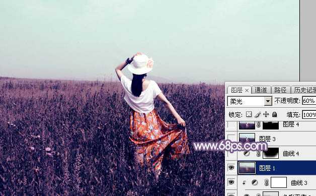 ‘Photoshop为旷野中的人物调制出流行的暗蓝色‘
